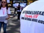 komunitas-aksi-peringati-hari-aids-sedunia-di-kota-malang_20221201_120735.jpg